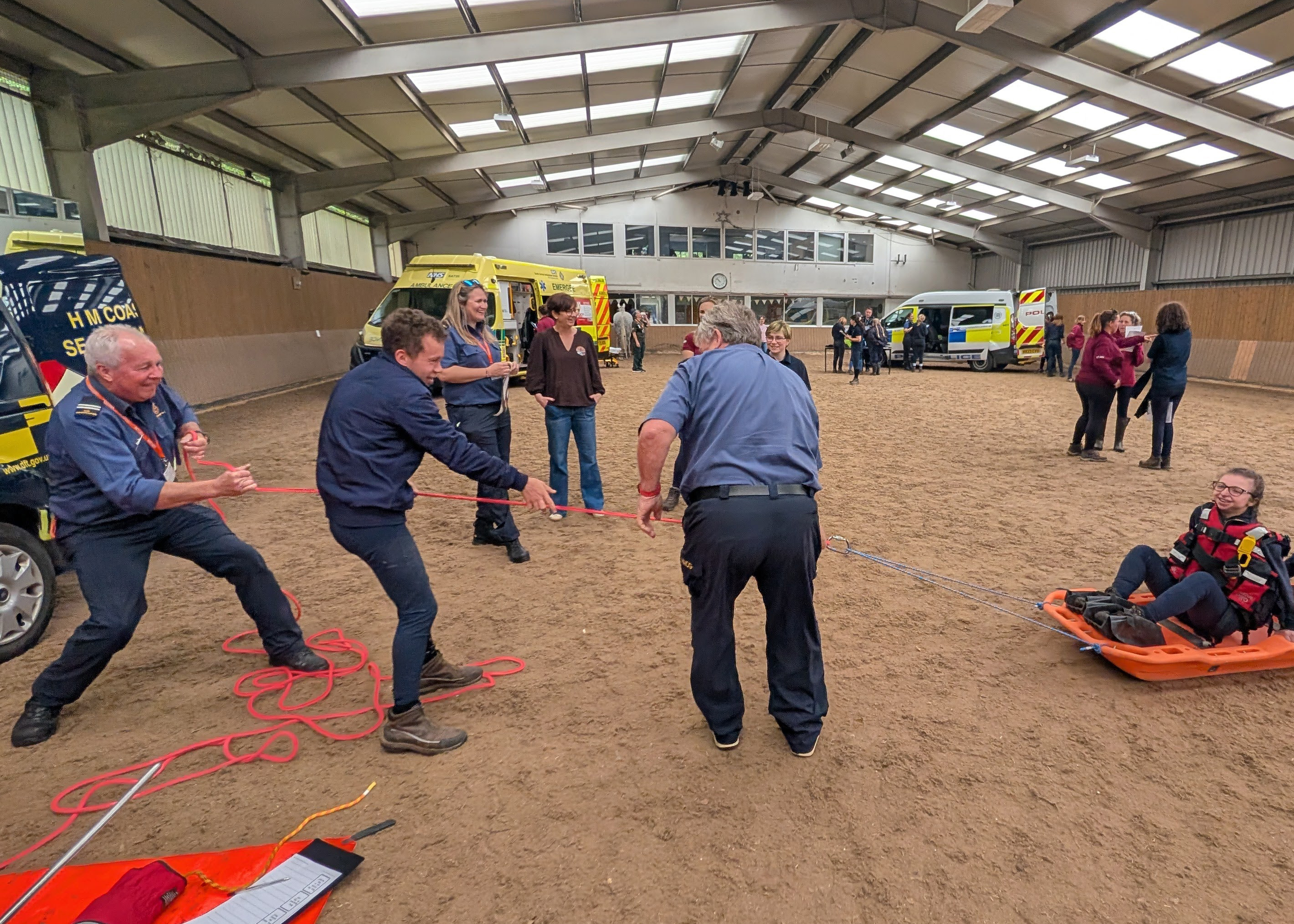 Coastguard role playing a rescue with Autistic adults.